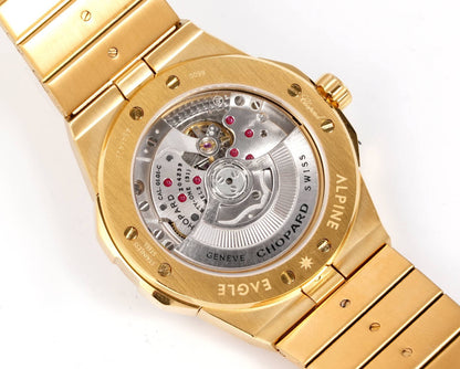 Alpine Eagle Purple Gem Bezel Gold Dial