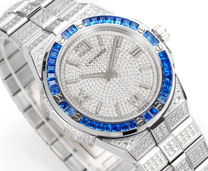 Alpine Eagle Diamond Pavé Blue Gem Bezel Gold